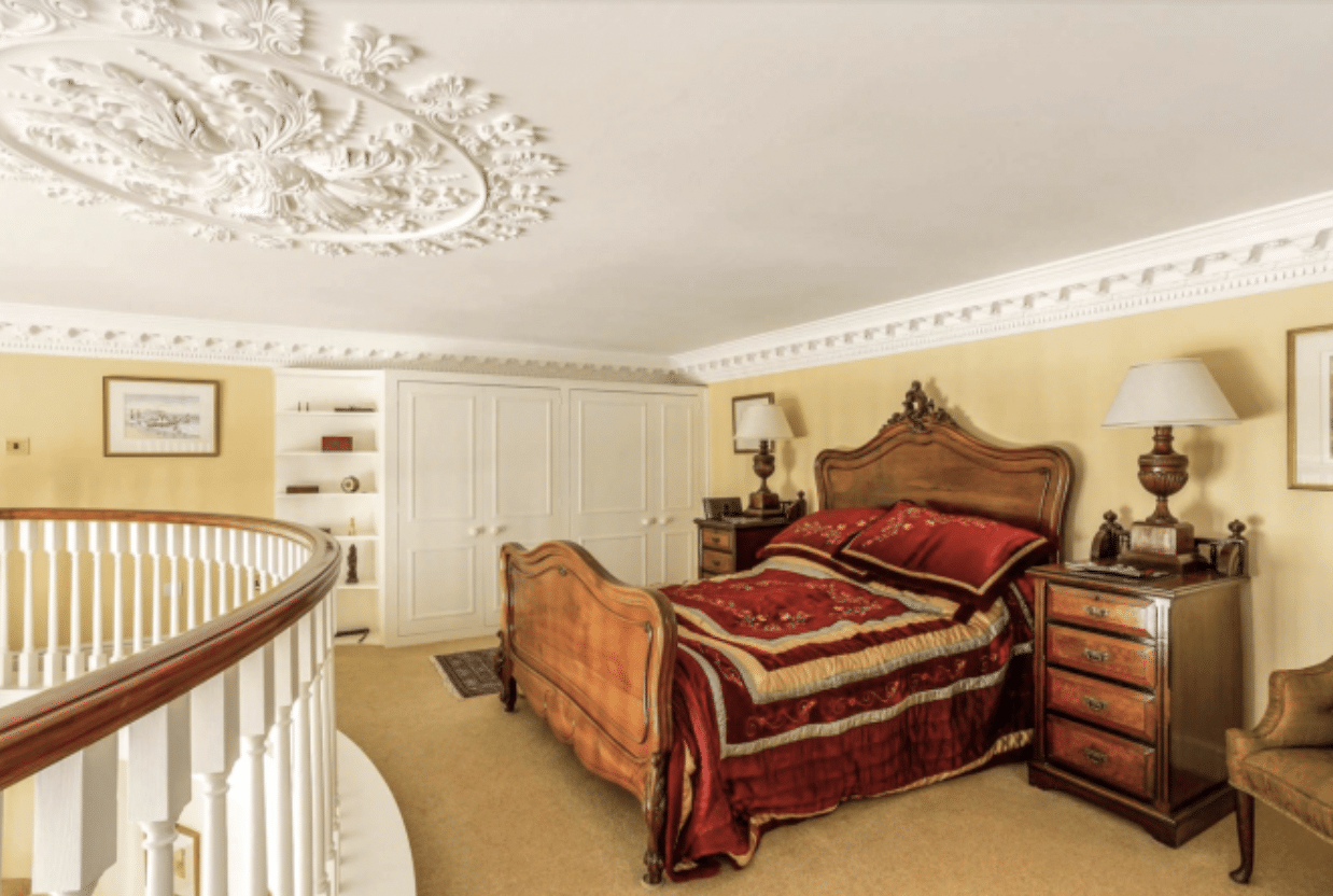 Inside bedroom of a Bridgerton style suite 